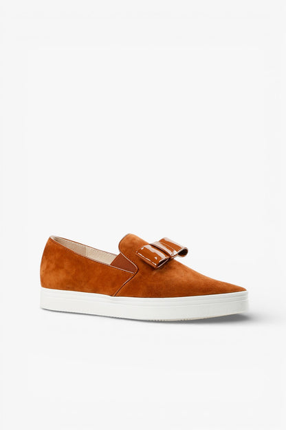 ALL BLACK Brown suede slip-on sneaker with patent bow detail and platform sole, women’s elevated casual comfort shoe for modern fall styling