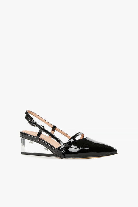 Women's black patent leather slingback pumps with clear architectural wedge heel and double strap bow detail side view.