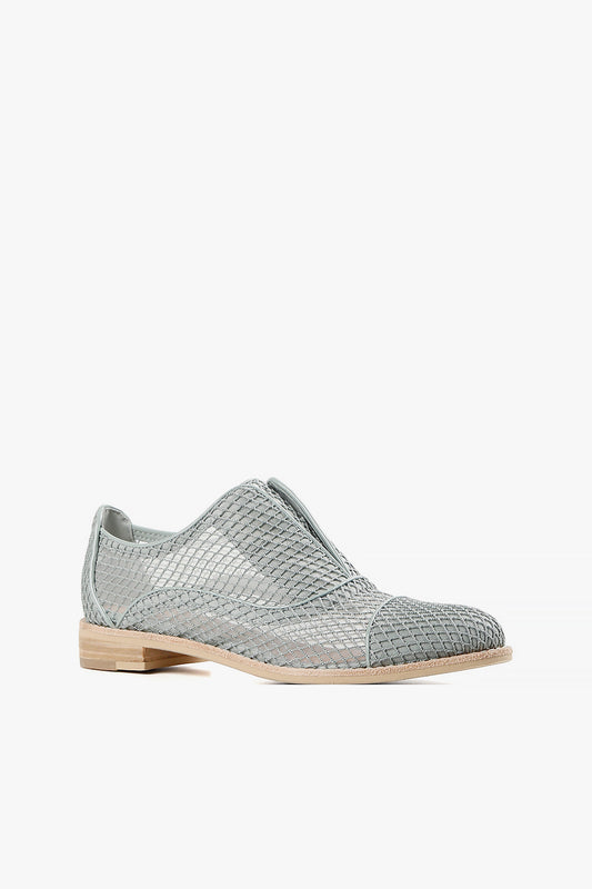 metallic green woven leather oxford with textured mesh pattern and stacked wooden heel, women’s modern lace-free dress shoe for contemporary fall styling