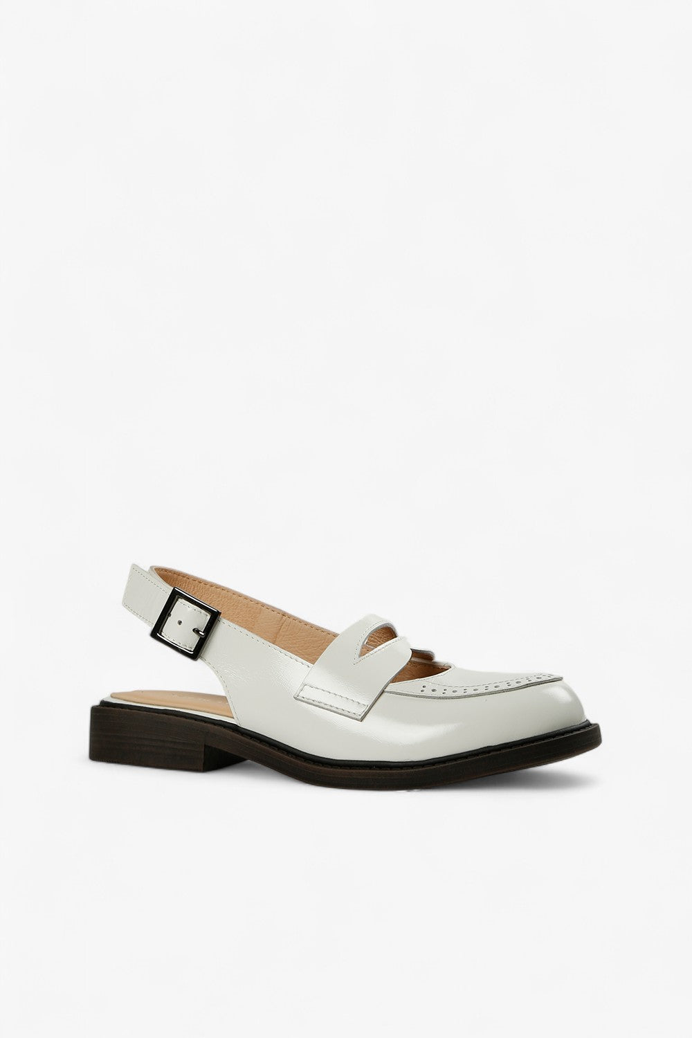 white leather Mary Jane slingback with black square buckle, low heel brogue detail, contemporary women’s fall shoe
