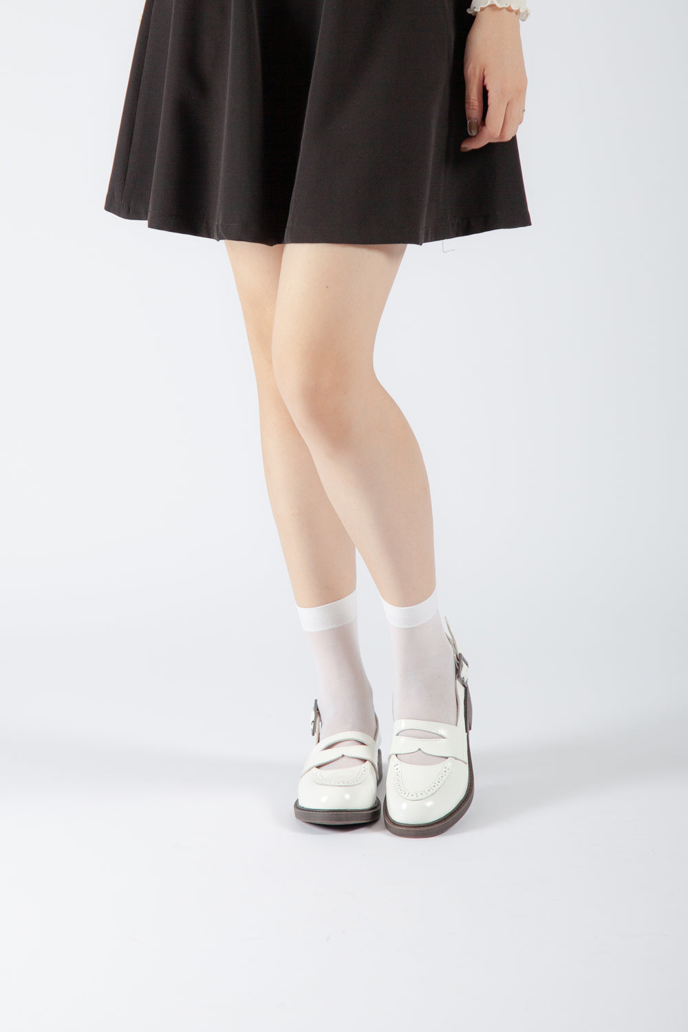 white leather Mary Jane heels for women, classic buckle strap dress shoes, contemporary feminine fall styling
