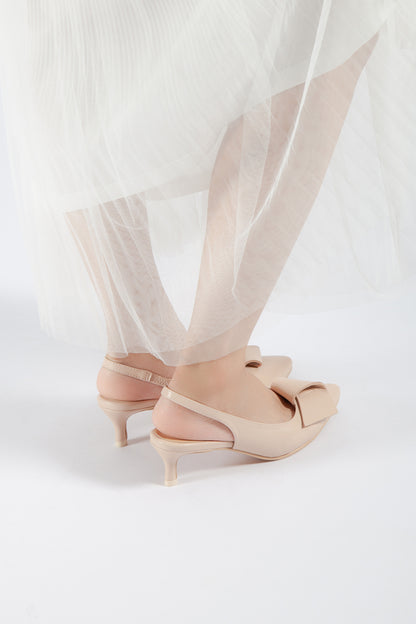 Back View of Women’s Pink Leather Flatbow Kitten Heel Slingback Pumps on Model