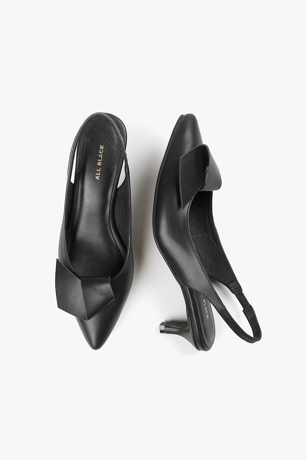 black leather slingback kitten heel pump with oversized bow detail and pointed toe, women’s elegant low heel dress shoe for fall styling