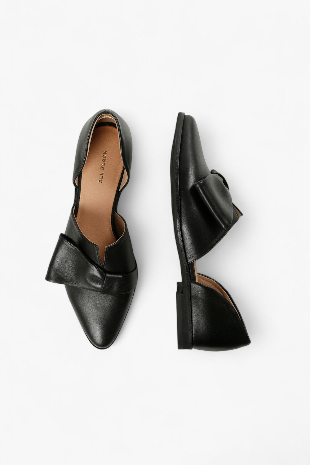 Close-Up of Soft Leather and Halfbow Detail on Women’s Black Pointed Toe D'Orsay Flat