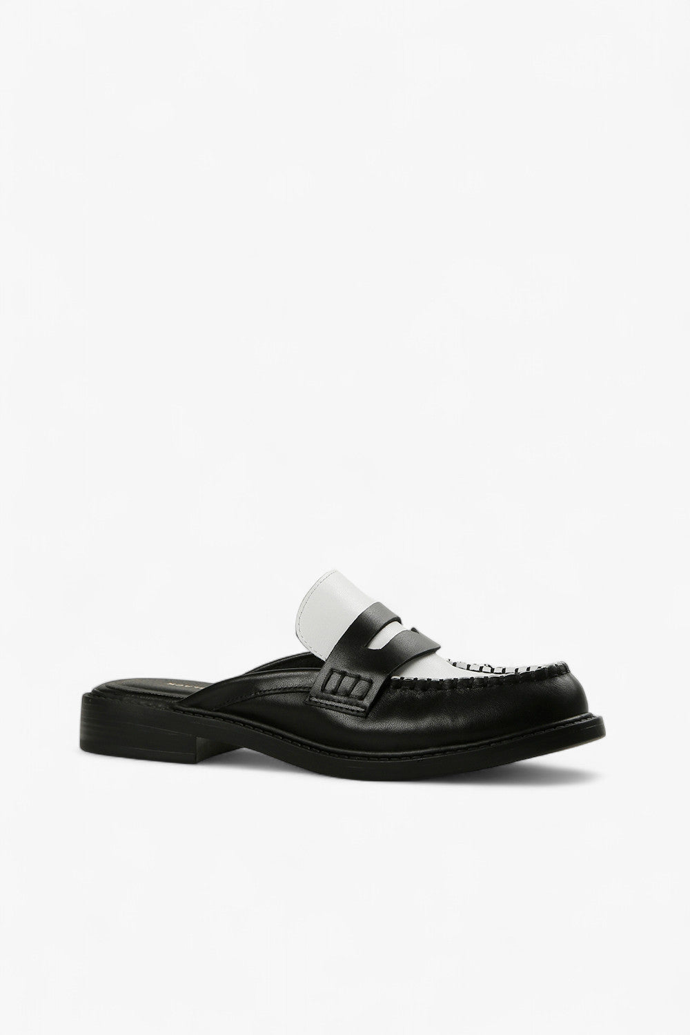  black and white leather penny loafer mule with contrast vamp and moc toe stitching, women’s low heel slip-on dress shoe for modern fall styling