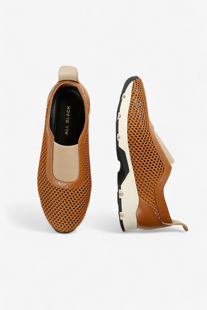 Close-Up of Brown Woven Mesh and Leather Detail on Women’s Slip-On Sneaker