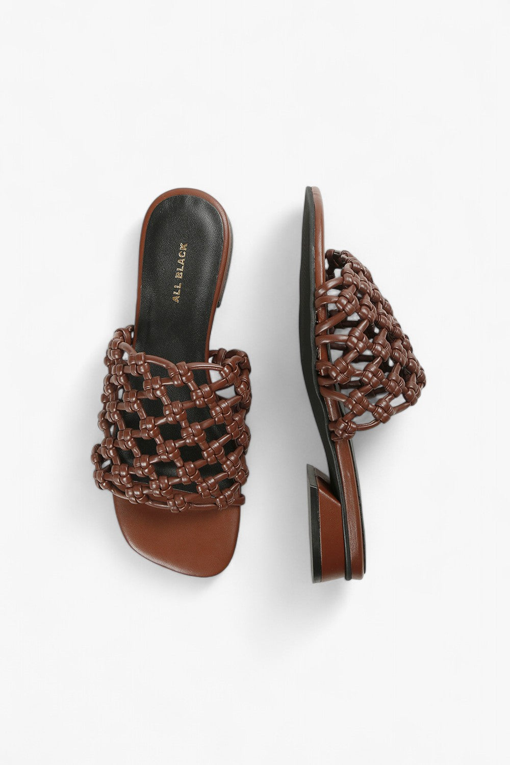 Top down and side view of women's coffee brown woven slides on a white background, highlighting the leather texture.