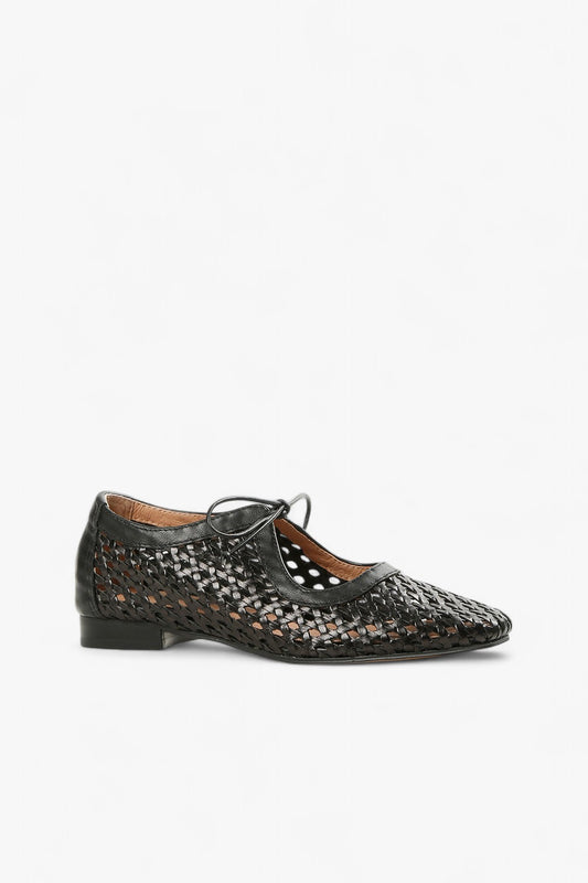 Women's black woven leather oxfords with front tie detail and flat black heel side view.