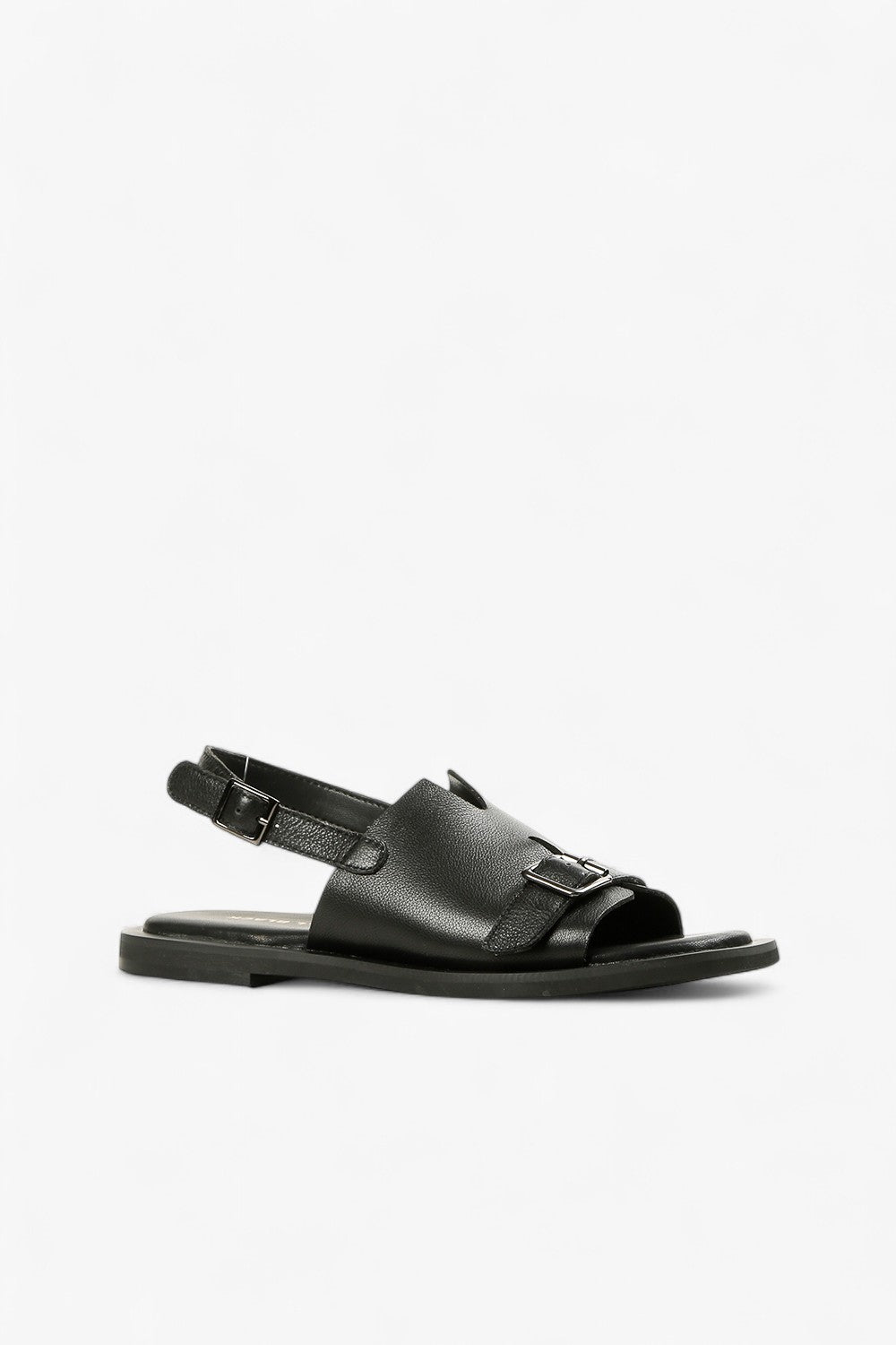 Women's black leather flat sandals with adjustable buckle strap and decorative front belt detail side view.