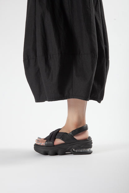 ALL BLACK Women’s Black Leather Platform Cushion Sandals Styled with Black Skirt